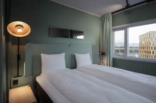 Bed of Standard twin room of Scandic Helsfyr in Norway