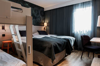 Bunk bed and bed in Standard Family room at Scandic Täby