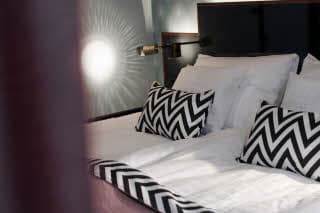 Haymarket-scandic-to-go-room-bed.jpg