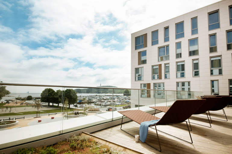 Sunbeds on terrace Scandic Kristiansand Bystranda