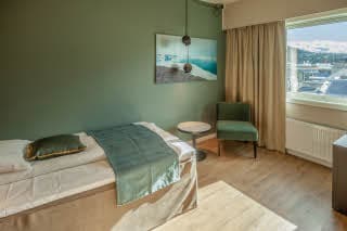 bed in single room at scandic harstad