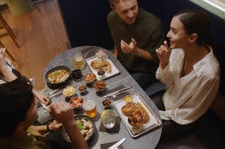 friends having dinner at scandic go